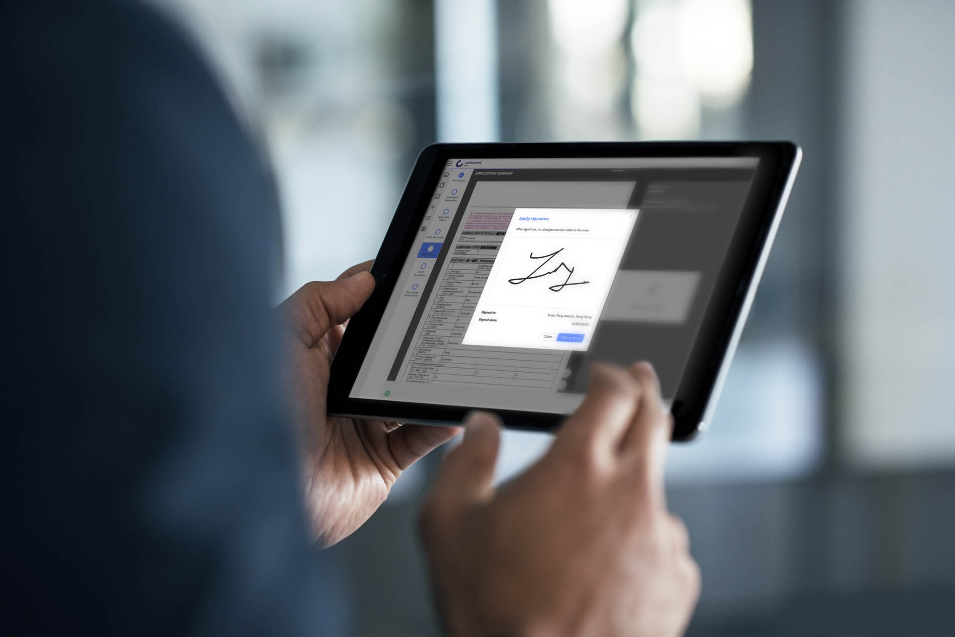 Closeup shot of a businessman analyzing statistics on a digital tablet in an office